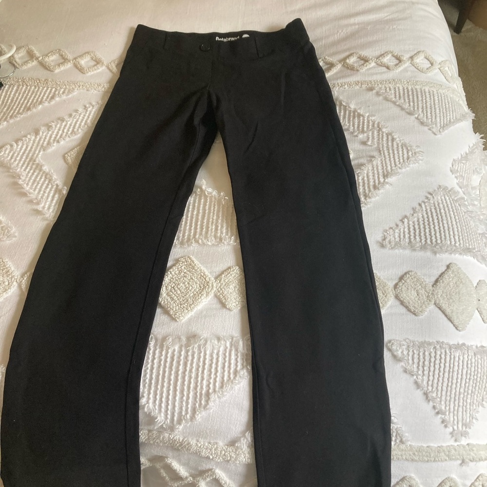 Women’s size medium Betabrand black petite classic dress pants.